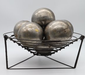 7 Vintage Spheres In A Metal Basket