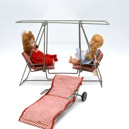 VINTAGE DOUBLE SWING , CHAISE AND 2 CELLULOID JOINTED DOLLS- SHIPPABLE