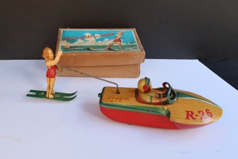 RARE VINTAGE SPPED BOAT WITH SKIER TOY