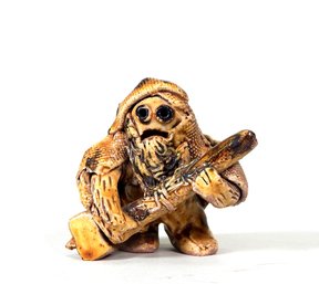 Scary Monster With Hammer Ceramic Figurine
