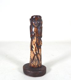 Antique Hand Carved Figure Holding Animal Trophy