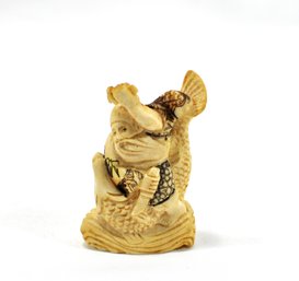 Antique Man With Knife And Fish Netsuke
