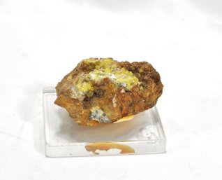 Rock Covered In  Pyromorphite Crystals Mounted On Stand