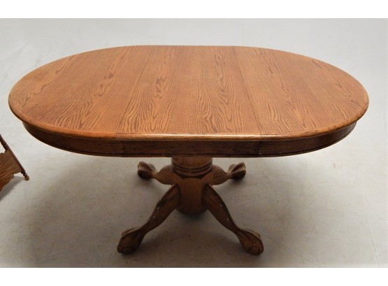 Oak Oval Dining Table W/ Claw Foot Style Pedestal.