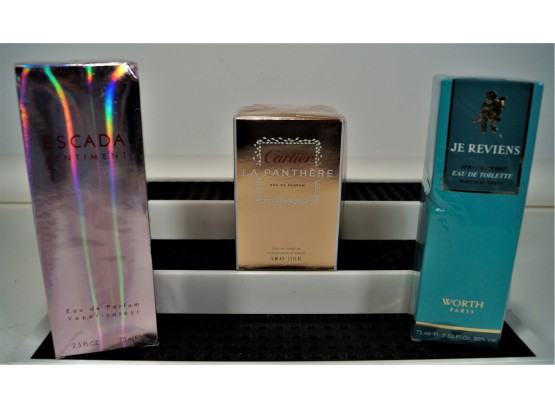 Lot 3 New Perfumes Escada, Cartier, JE Reviens