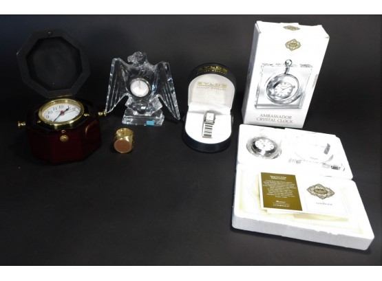 Lot Of Clocks And A Watch