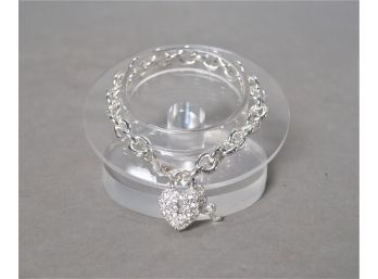 Silvertone Linked Bracelet With Charm.
