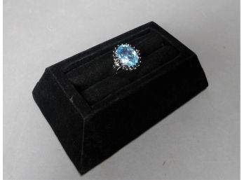 Sterling Ring With Blue Topaz Surrounded By Sapphires