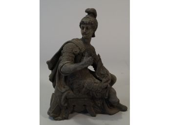 Metal Statue Of A Sitting Man
