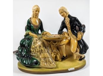 Kitschy Vintage Figurative Chalk Ware Checkers Playing George And Martha Washington (?) Lamp