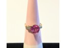 10 K Marked Gold Ring Topped With A Bright Pink Stone  - 2.2g - Size 6