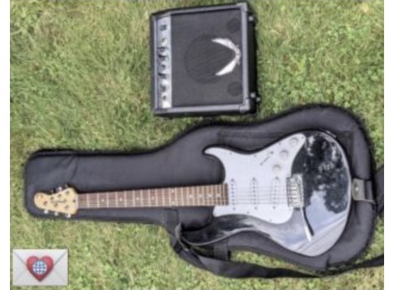 Dean Playmate Children's Slick Black Electric Guitar - A Levy Guitar Case - And A Small Dean Amplifier