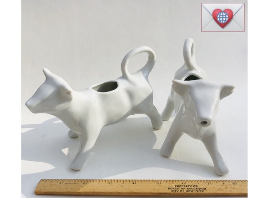 Pair Of Cute White Glazed Porcelain Cow Creamers