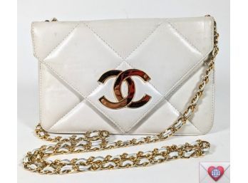 White CC Purse With Gold Accents And Chain Shoulder Strap