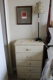 Dresser With Lamp And Art