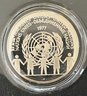 1977 Franklin Mint Sterling Silver United Nations Peace Medal With Paperwork, Original Box, & Plastic Case