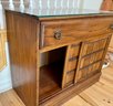 MCM Wood Sliding Front Door Small Buffet With Drawer And Glass Top