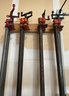 (8) Large Assorted Size Pipe Clamps