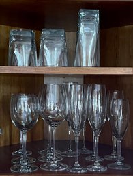 Assorted Glassware - Wine Glasses, Champaign Glasses, Low Balls, And Tumblers