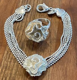 Sterling Silver Flower Size 8 Ring And Matching Multi Strand 7.5 Inch Bracelet - Total Weight 21.1 Grams