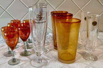 Glassware Lot - Etched Cordials, Vintage Budweiser Pilsners, Handblown Art Glass Tumblers, And Crystal Vases