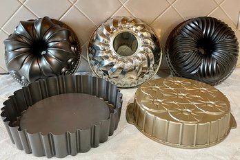 (3) Nordicware Bunt Pans, Kaiser Vintage Bunt Pan, And Cheesecake Pan