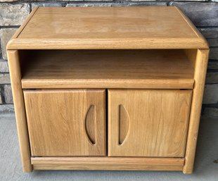 Small Aspen Furniture Oak And Veneer Media Cabinet On Plastic Casters