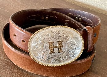 Tony Lama 36' Leather Belt With Silver Tone Accents And A Montana Silver Smiths Belt Buckle