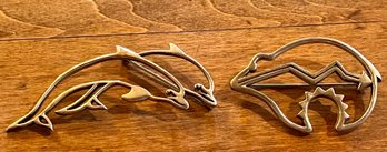 (2) Sterling Silver Pins Native American Bear & Pair Of Dophins - Total Weight 17.95 Grams