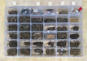 Plastic Organizer With Large Assortment Of Fishing Hooks