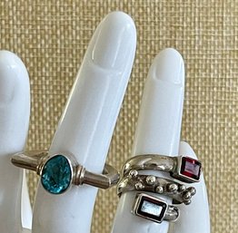 (2) Sterling Silver Rings Faceted Garnet & Blue Topaz - Both Size 4.5 - Total Weight 12.9 Grams