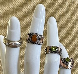 (4) Sterling Silver Pinky Rings (2) Peridot - (1) Baltic Amber - (1) Band -Size 2.75-3  Weight 17.5 Grams