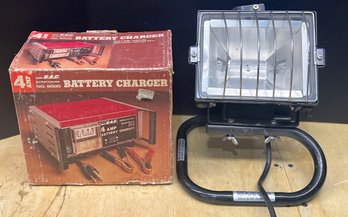 4 Amp Battery Charger With Original Box And Corded Work Light ( As Is )