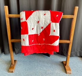 Vintage Red And White Knot Quilt With Dark Pine Quilt Rack
