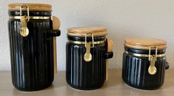 Black Ceramic With Wood Top Cannister Set W 2 Wood Spoons ( Missing One Spoon )