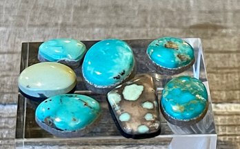 7 Kingman Turquoise Cabochons Total Weight 27 Carats