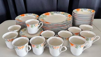 Place Setting Of 12 Gibson China Dinnerware