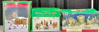 (3) Porcelain Lighted Village Houses And Sleigh Ride Sets