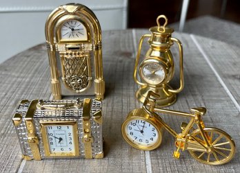 4 Vintage Timex Miniature Desk Clocks - Suitcase - Radio - Lantern & Bicycle