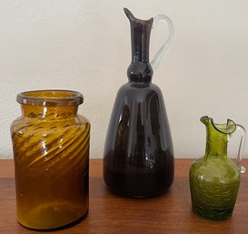Antique Cased Glass Pitcher, Amber Swirl Jar, And A Green Crackle Glass Pitcher