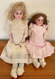 (2) Armand Marseille's Antique Bisque Dolls With Leather Bodies And Lace Clothing