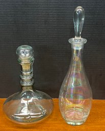 (2) Glass Decanters With Stoppers - (1) Iridescent