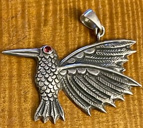 Sterling Silver Repousse Humming Bird Pendant With Garnet Eye - Total Weight 8.3 Grams