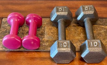 Pair Of Cast Iron Hex 10 Pound Dumbbells And A Set Of 3 Pound Purple Dumbbells