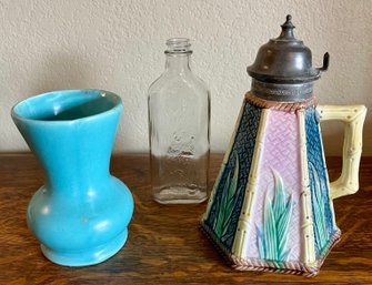 Etruscan Majolica Lidded Pitcher, Blue Pottery Vase, And Mouse Clear Bottle