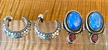 2 Pairs Of Sterling Silver Earrings (1) Pair Hoops & (1) Pair Blue Topaz And Garnet - 18.1 Grams