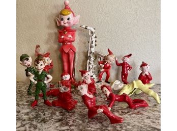 Assorted 1950's Shelf Elf's Including L&M Saxophone Player, Assorted Standing And Sitting Elves