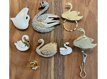 Assorted Swan Jewelry Including Rhinestone & Enamel Pins, Porcelain Pendant, Glasses Holder And More