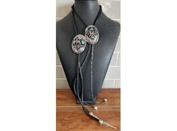 (2) Vintage SSI Silver Plate Coral And Turquoise Bolo Ties With Black Leather Braid Ties And Silver Tone Tips