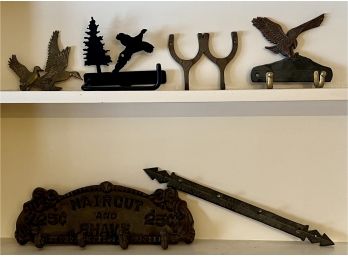 Assorted Metal Wall Hooks And Art Including Brass Ducks, Cast Iron 25 Cent Barber Sign, And More